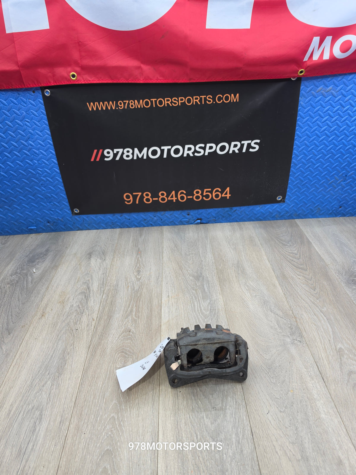 2008-2010 Subaru wrx 2.5 left driver front brake caliper 26292FE011 image 0