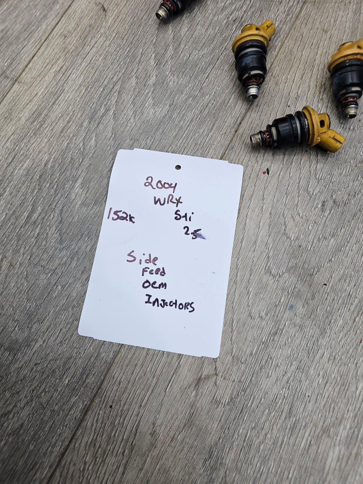 2004-2006 Subaru wrx sti 2.5 oem side feed fuel injector set 16600AA170 image 1